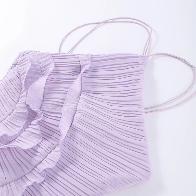 Light purple pleated top on a white background