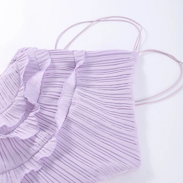 Light purple pleated top on a white background