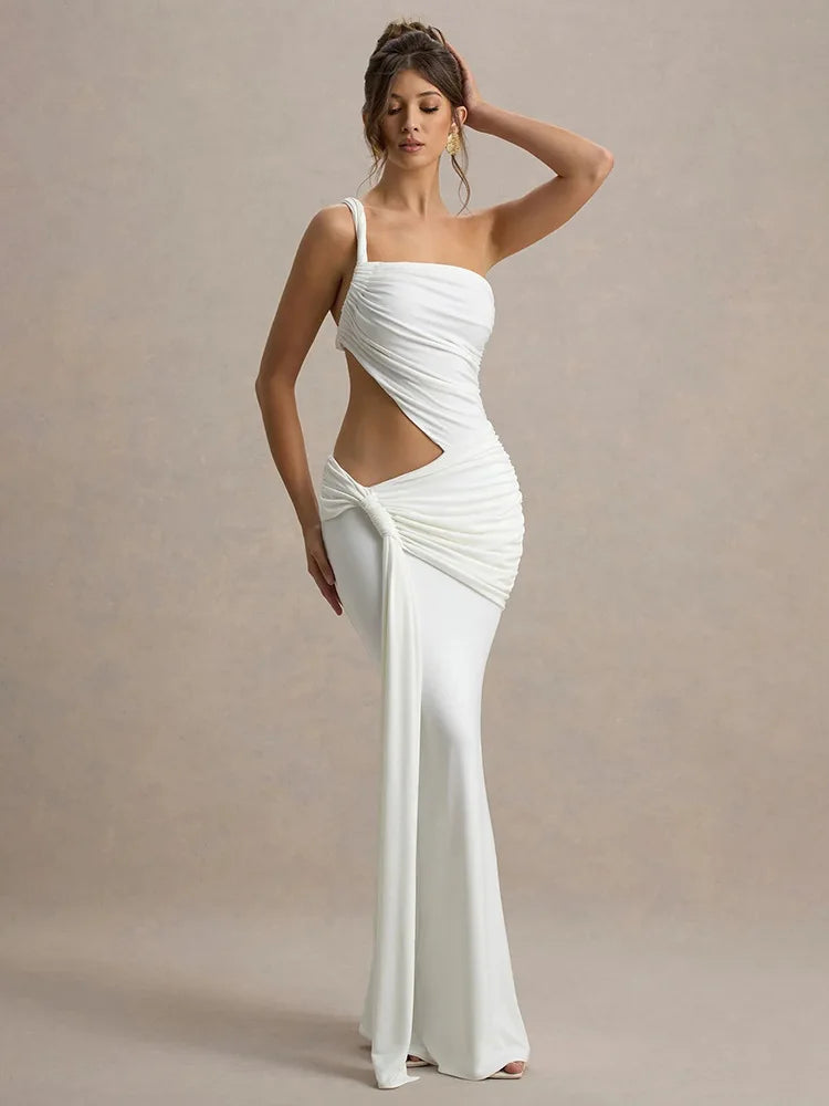 A model wearing white one-shoulder maxi dress with a ruched design and a cut-out at the hollow of the neck.