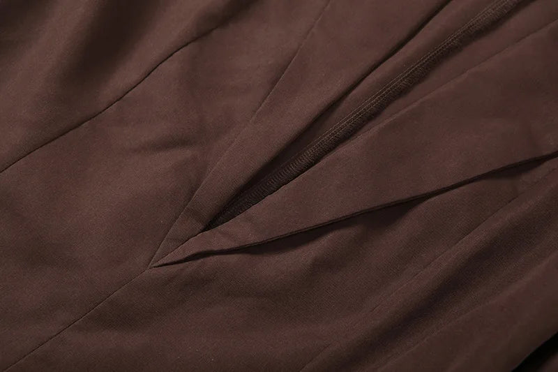 Close-up of brown fabric with folds