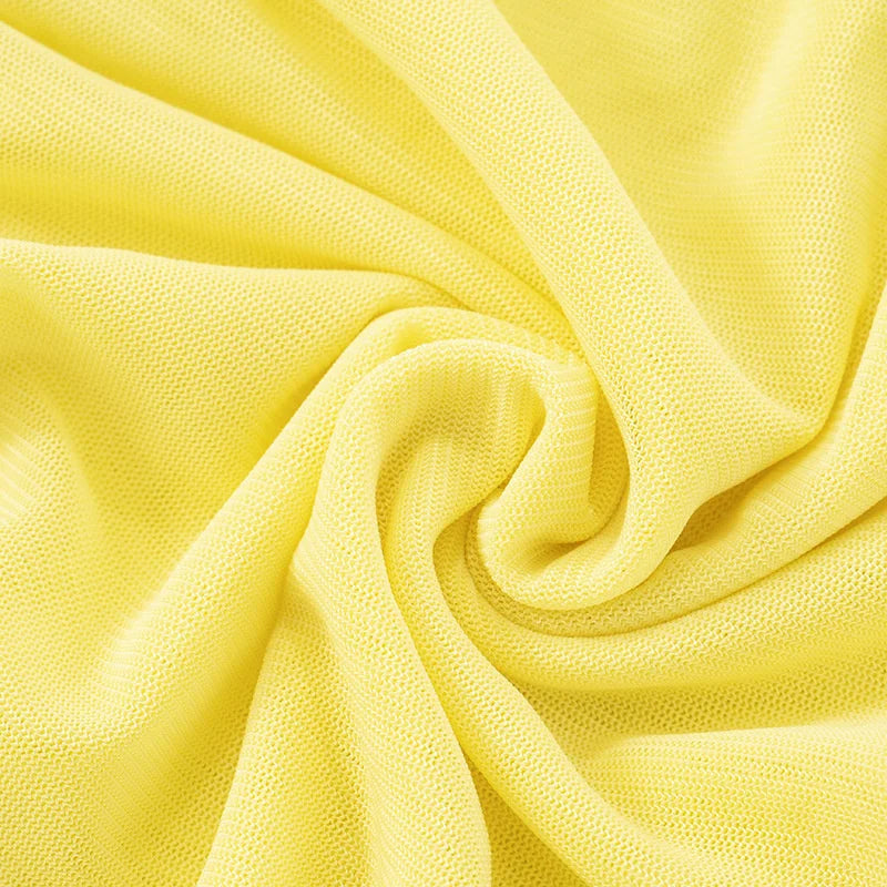 Close-up of yellow fabric with a soft texture