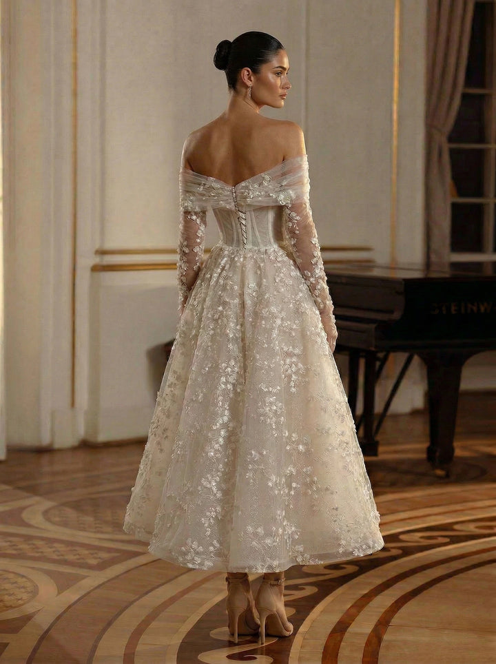 Woman in a white sequin dress standing in an elegant room with a piano.
