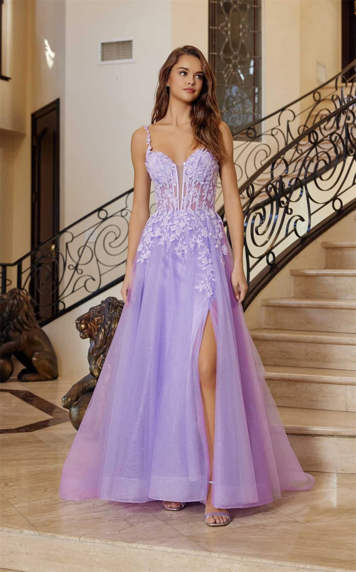 Woman in a lavender evening gown standing in an elegant interior setting.