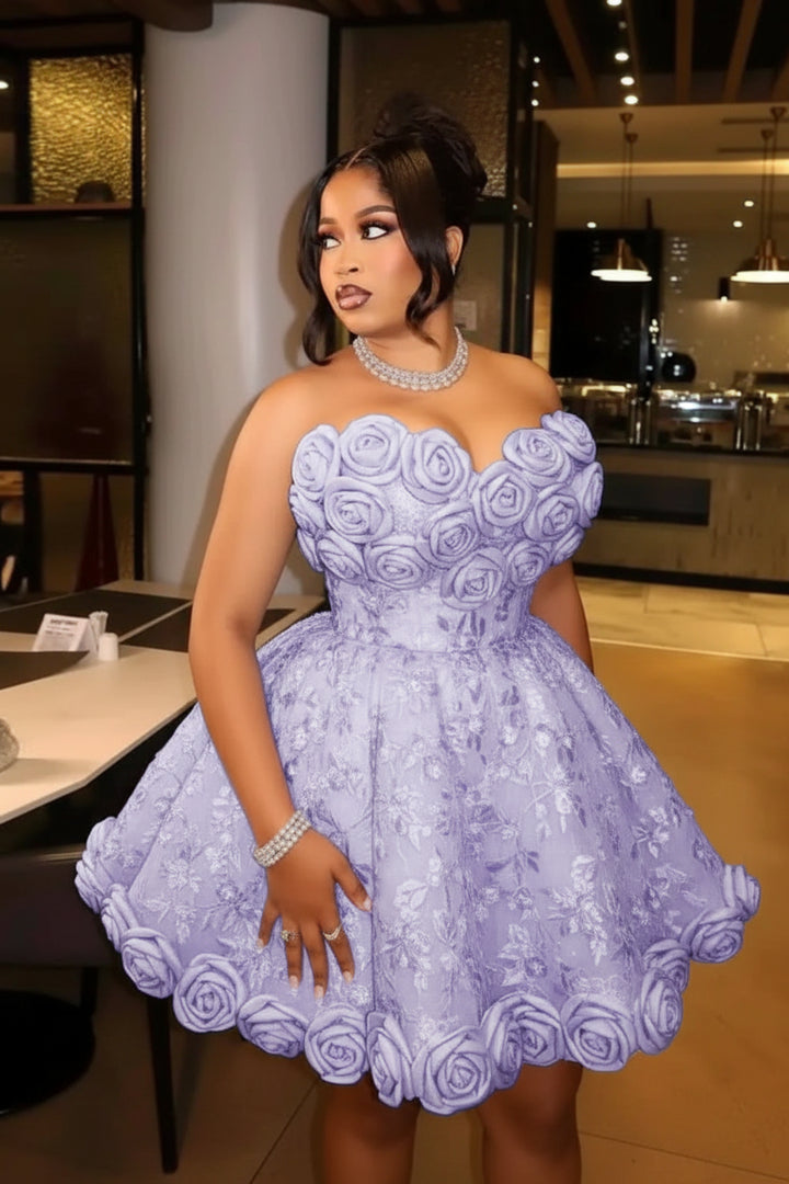 A woman wearing a strapless lavender lace dress with 3D rose applique and a flared skirt, standing in an indoor restaurant or event space.