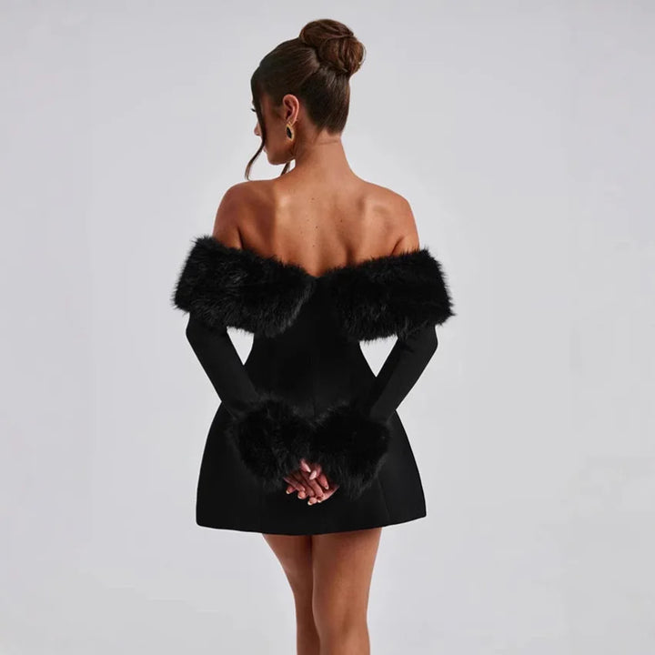 Black off-shoulder dress with fur trim on a plain background