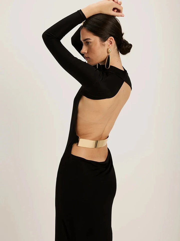  Black Maxi Dress combines sophisticated elegance with contemporary edge. This striking black gown features a high half-collar neckline and form-fitting bodycon silhouette that flatters your figure, while the dramatic backless design creates an unforgettable statement. 