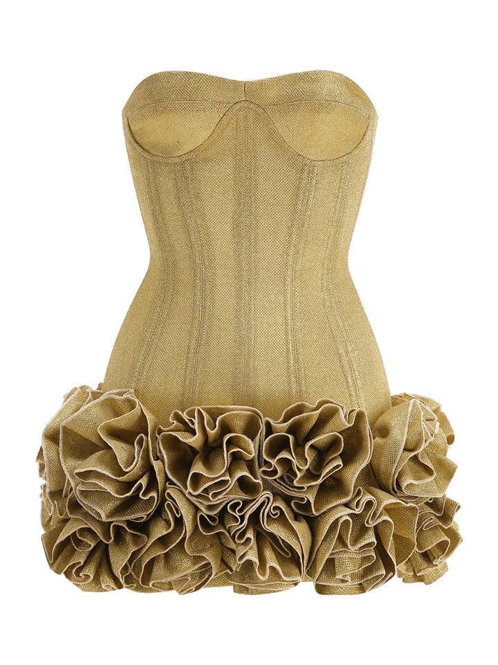 Gold mini dress with ruffled bottom on a white background