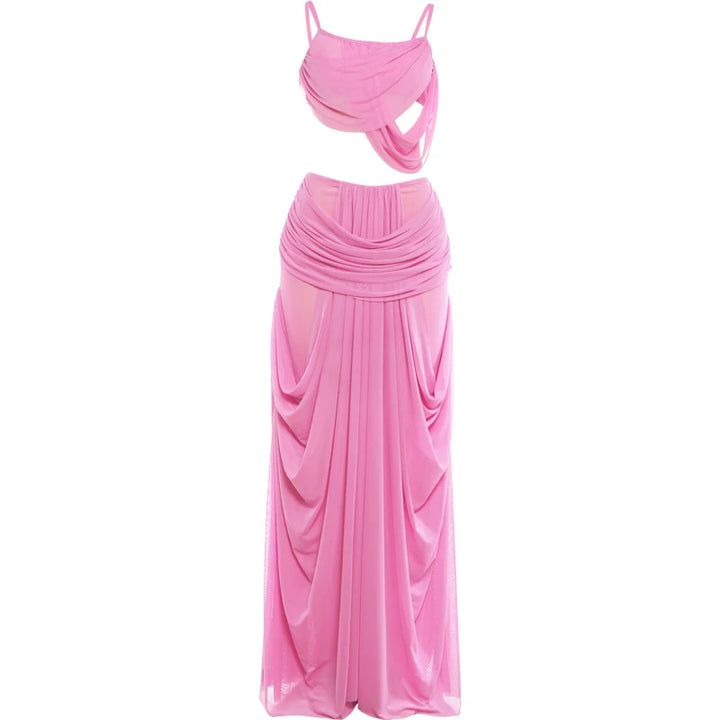Pink two-piece dress with top and flowing skirt on a white background