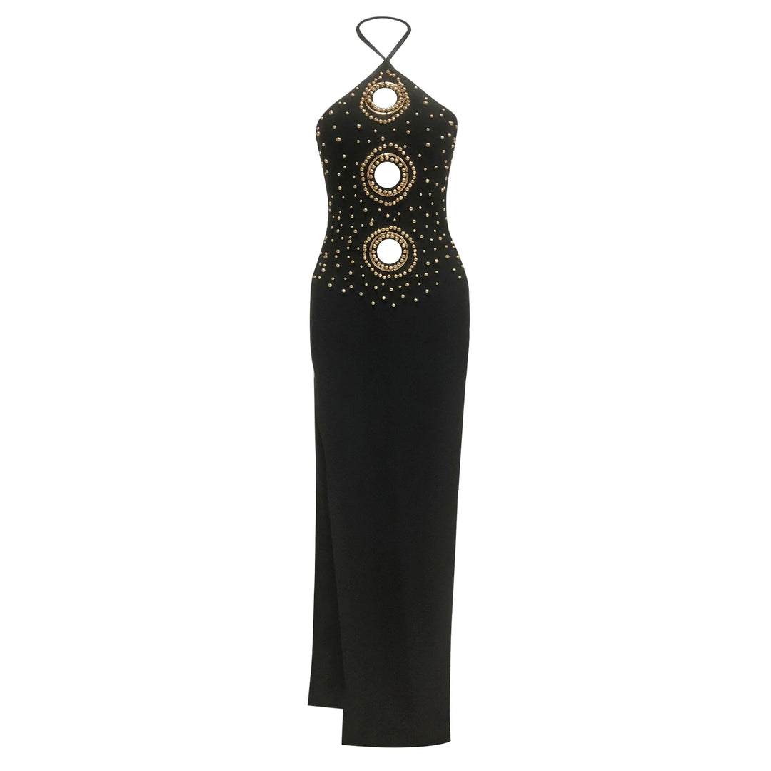 Black halter neck dress with gold circular embellishments on a white background