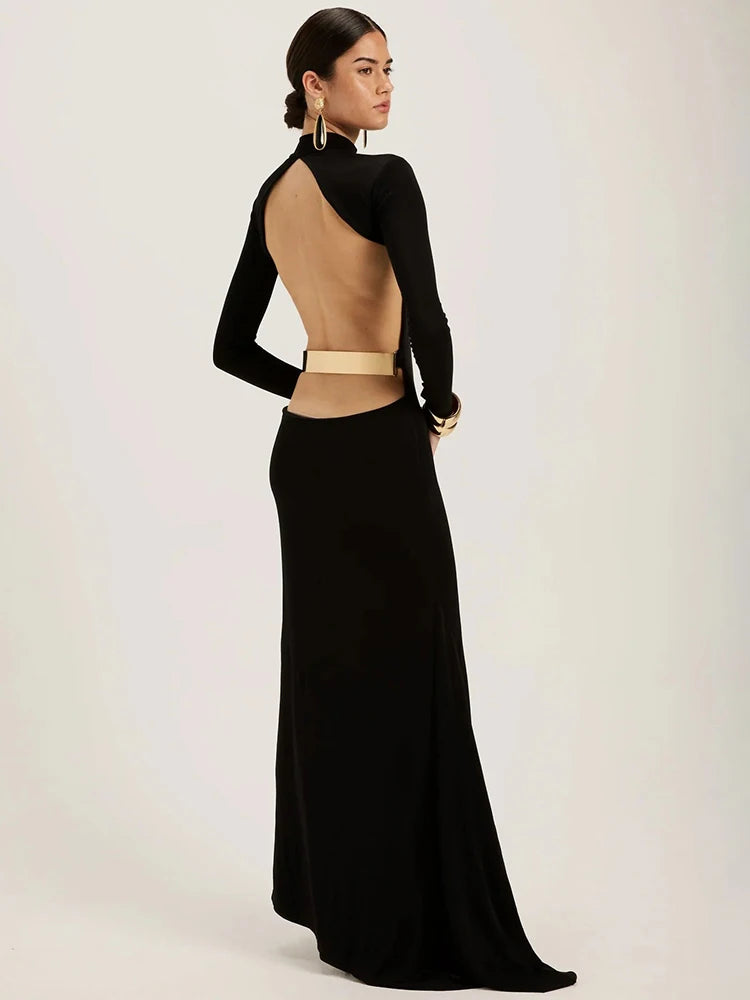  Black Maxi Dress combines sophisticated elegance with contemporary edge. This striking black gown features a high half-collar neckline and form-fitting bodycon silhouette that flatters your figure, while the dramatic backless design creates an unforgettable statement. 