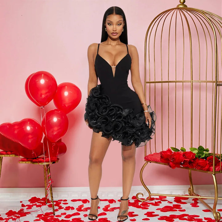 black mini dress This sleeveless bodycon silhouette features a flattering V-neckline and delicate straps that frame the shoulders beautifully