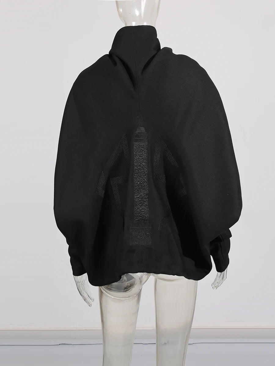 Black jacket on a mannequin against a white background