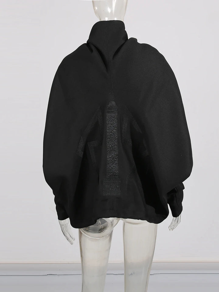 Black jacket on a mannequin against a white background
