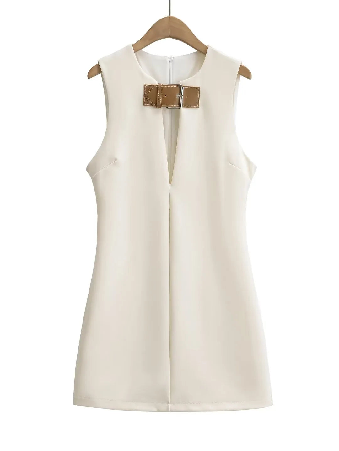 White sleeveless dress with a brown bow on a hanger against a white background