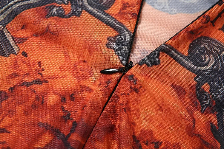 Woman in a patterned outfit standing in a bathroom