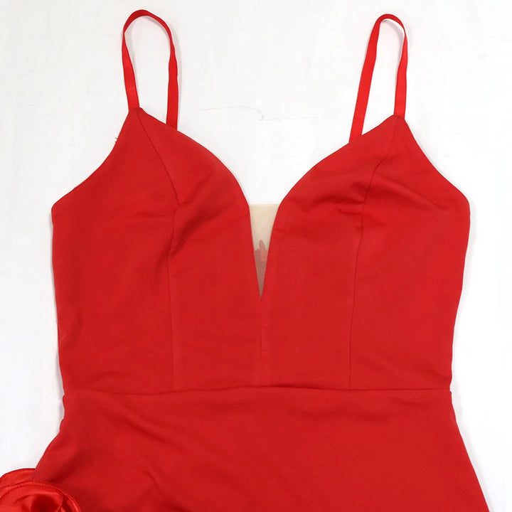 Red dress with thin straps on a white background