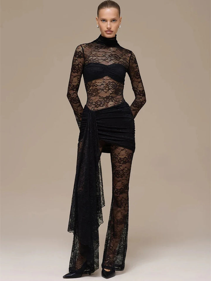 Model wearing a black lace outfit on a beige background