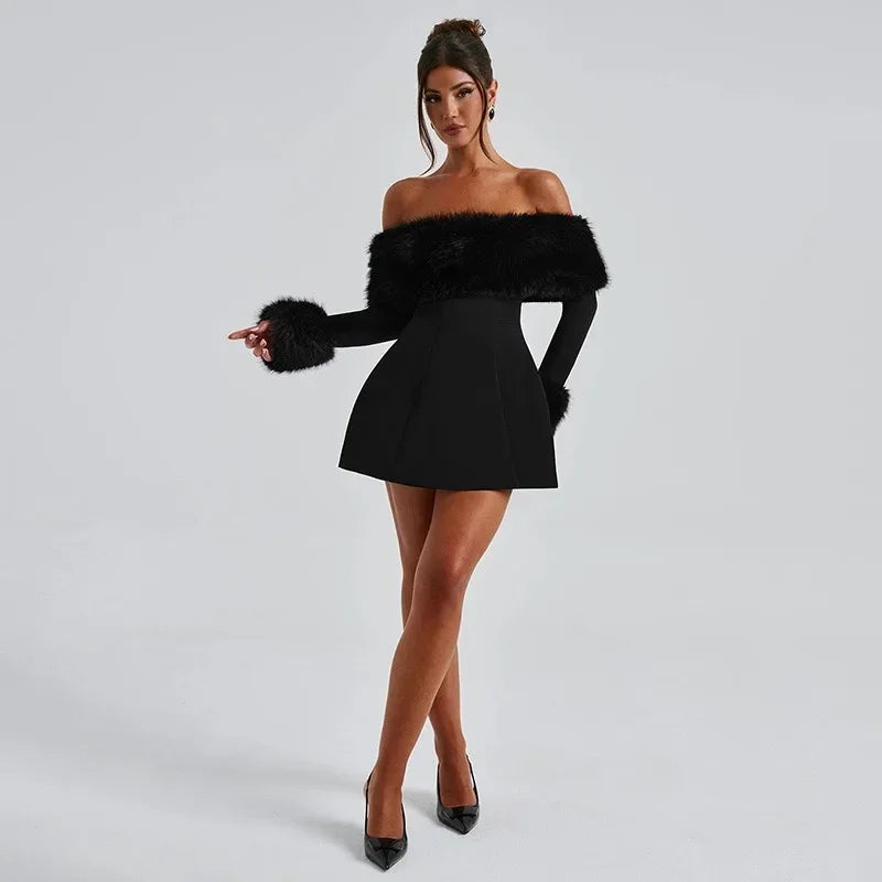 Woman wearing a black off-shoulder dress with fur trim on a gray background