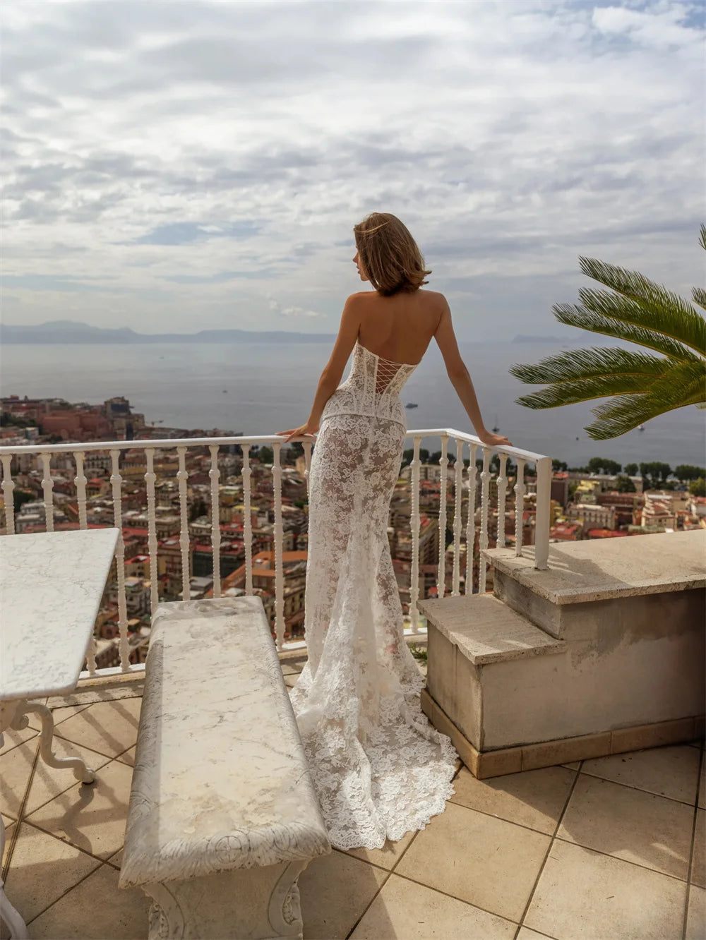 Maxi Dress is a striking off-white lace wedding gown designed for the modern bride seeking timeless elegance with contemporary edge