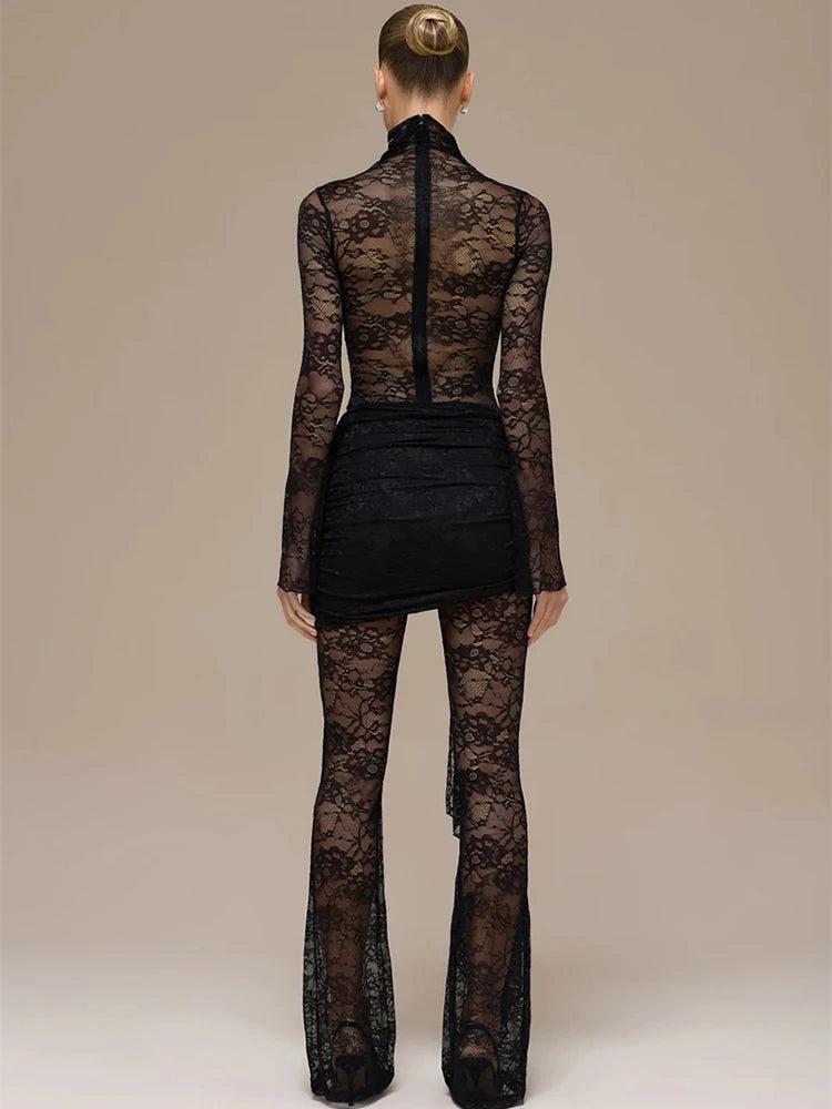 Black lace outfit worn by a model on a beige background