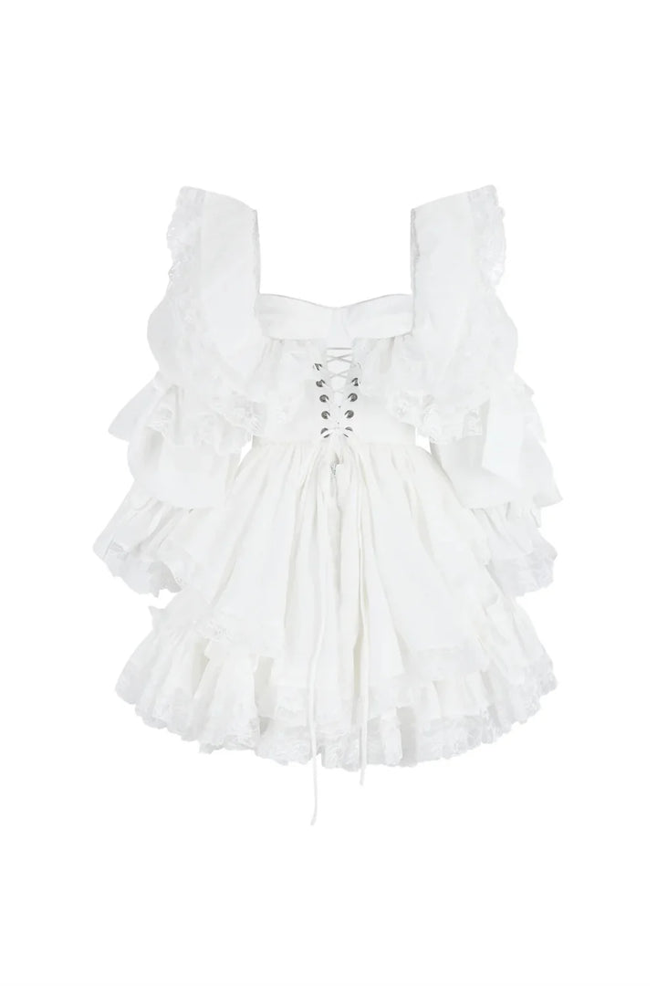 A white ruffled babydoll dress with a lace-up corset bodice, square neckline, and voluminous tiered skirt, shown against a plain white background.