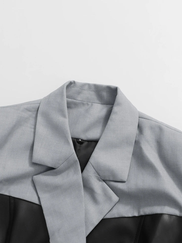 Gray coat with a collar on a light gray background
