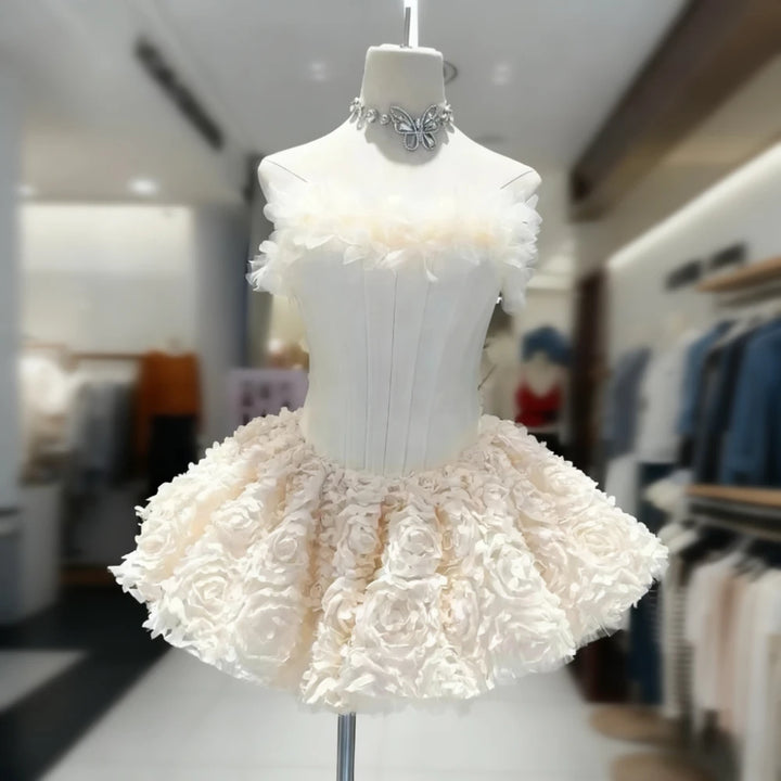 Ivory floral dress on a mannequin in a store setting