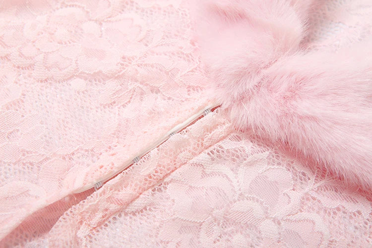 Close-up of pink fur with a zipper, soft focus