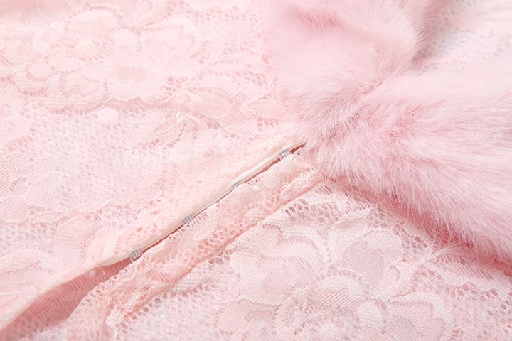 Close-up of pink fur with a zipper, soft focus