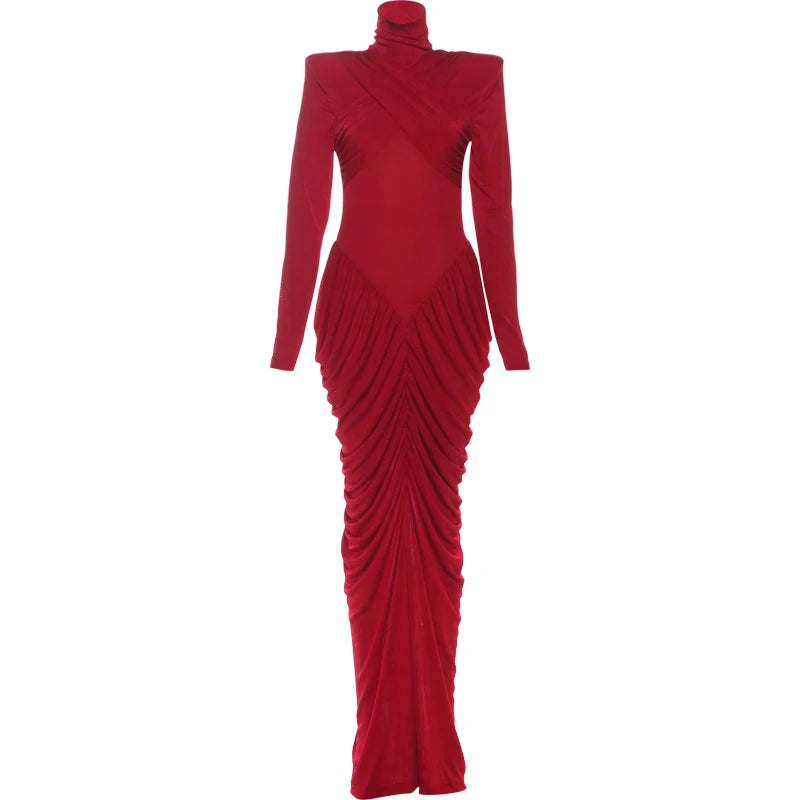 Red evening gown with long sleeves and ruched skirt on a white background