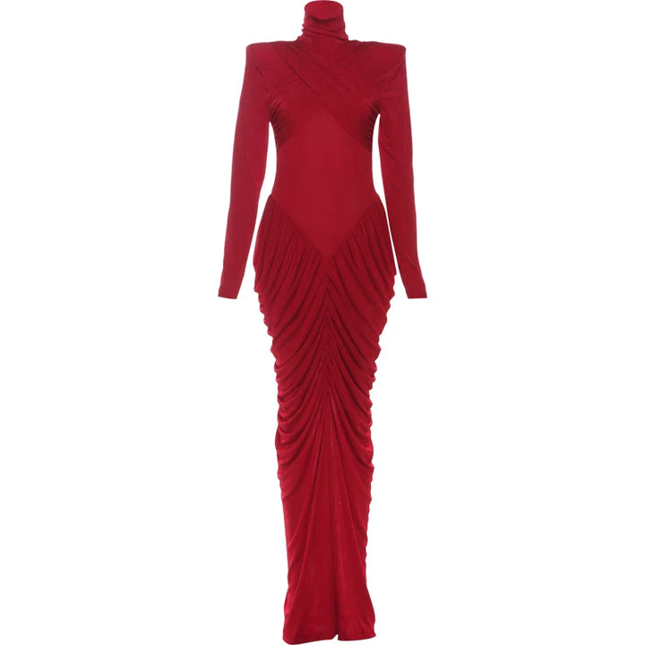 Red evening gown with long sleeves and ruched skirt on a white background