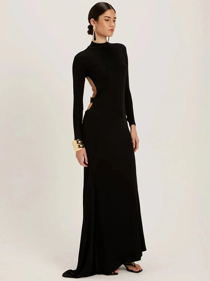  Black Maxi Dress combines sophisticated elegance with contemporary edge. This striking black gown features a high half-collar neckline and form-fitting bodycon silhouette that flatters your figure, while the dramatic backless design creates an unforgettable statement. 