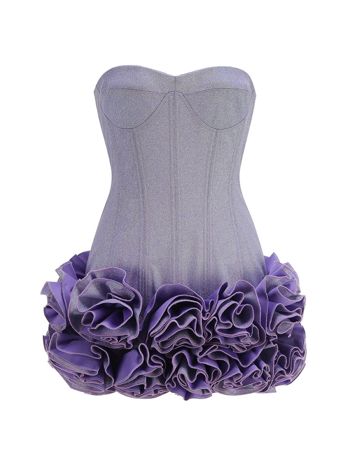 Purple strapless dress with ruffled skirt on a white background