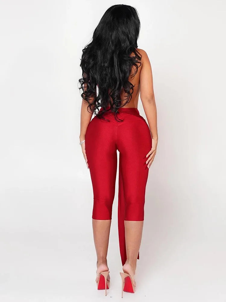 Person wearing a red jumpsuit on a white background